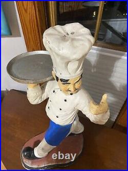 Restaurant Decoration. Pizza Chef Statue with Pizza Plate
