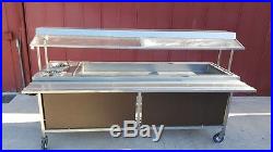 Salad bar stainless steel 2-7 plate holders (used) non refrigerated withcastors