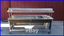 Salad bar stainless steel 2-7 plate holders (used) non refrigerated withcastors